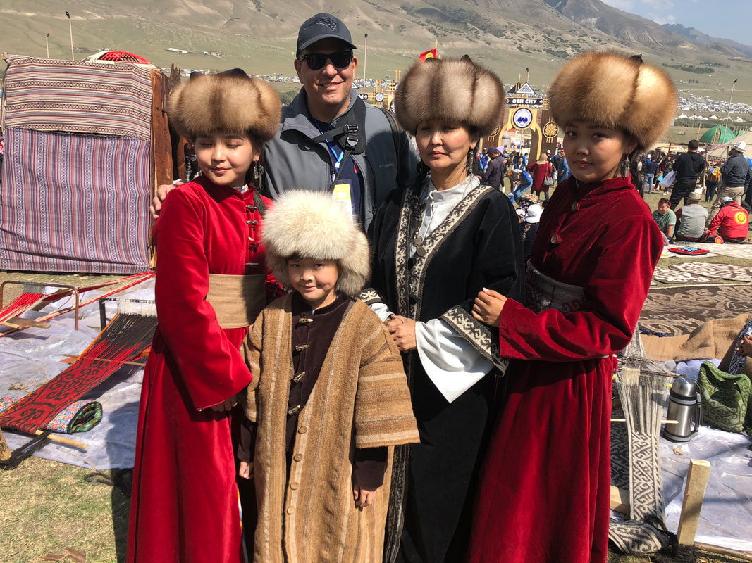 Meeting some of the locals at the World Nomad Games in Kyrgyzstan.
