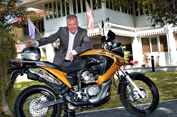 Denmark ambassador in Thailand with his motorcycle